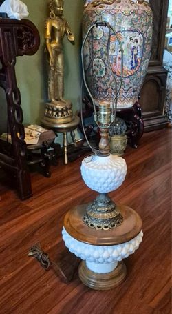 vintage mid-century table lamp light featuring white hobnail milk glass sections combined with turned wood and brass-tone metal accents.