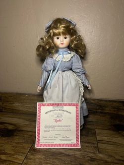 Small striped dress doll blue dress