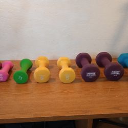Assortment Of Colorful Dumbbells 