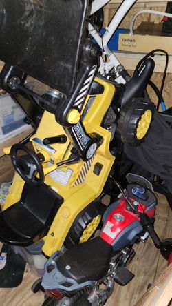 Kids ride on bulldozer