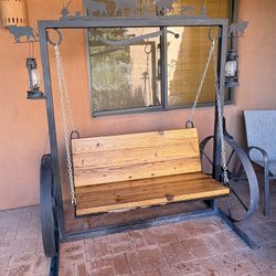 Wooden Swinging Bench With Southwest Themed Metal Frame For Patio Or Outdoors