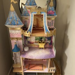 KidKraft Disney Princess Royal Celebration Wooden Castle Dollhouse