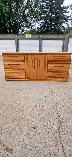 6 Drawer brown dresser with open cabinet