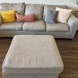 Three Piece Gray Sofa and Ottoman Set