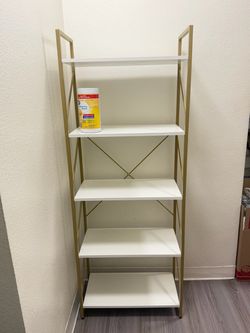 White and gold shelving