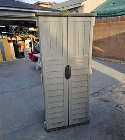 Suncast Outdoor storage unit, good condition with shelves, Price is firm