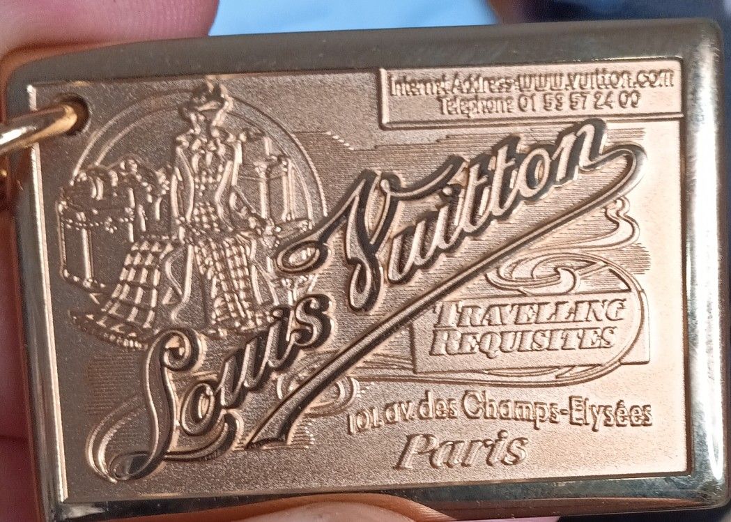 Louis Vuitton “Traveling Requisites” Gold Keychain / Bag Charm M65374 – New with Dust Bag