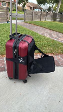 Lug A Bug Travel Seat attaches to luggage