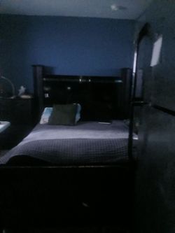Black Wood Four-Post Bed Frame