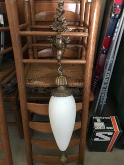 antique hanging lit light.