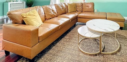 Large brown sofa with chase and ottoman