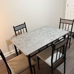 Table and 4 chairs