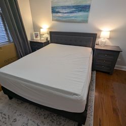 Queen bed frame, queen mattress, and mattress topper