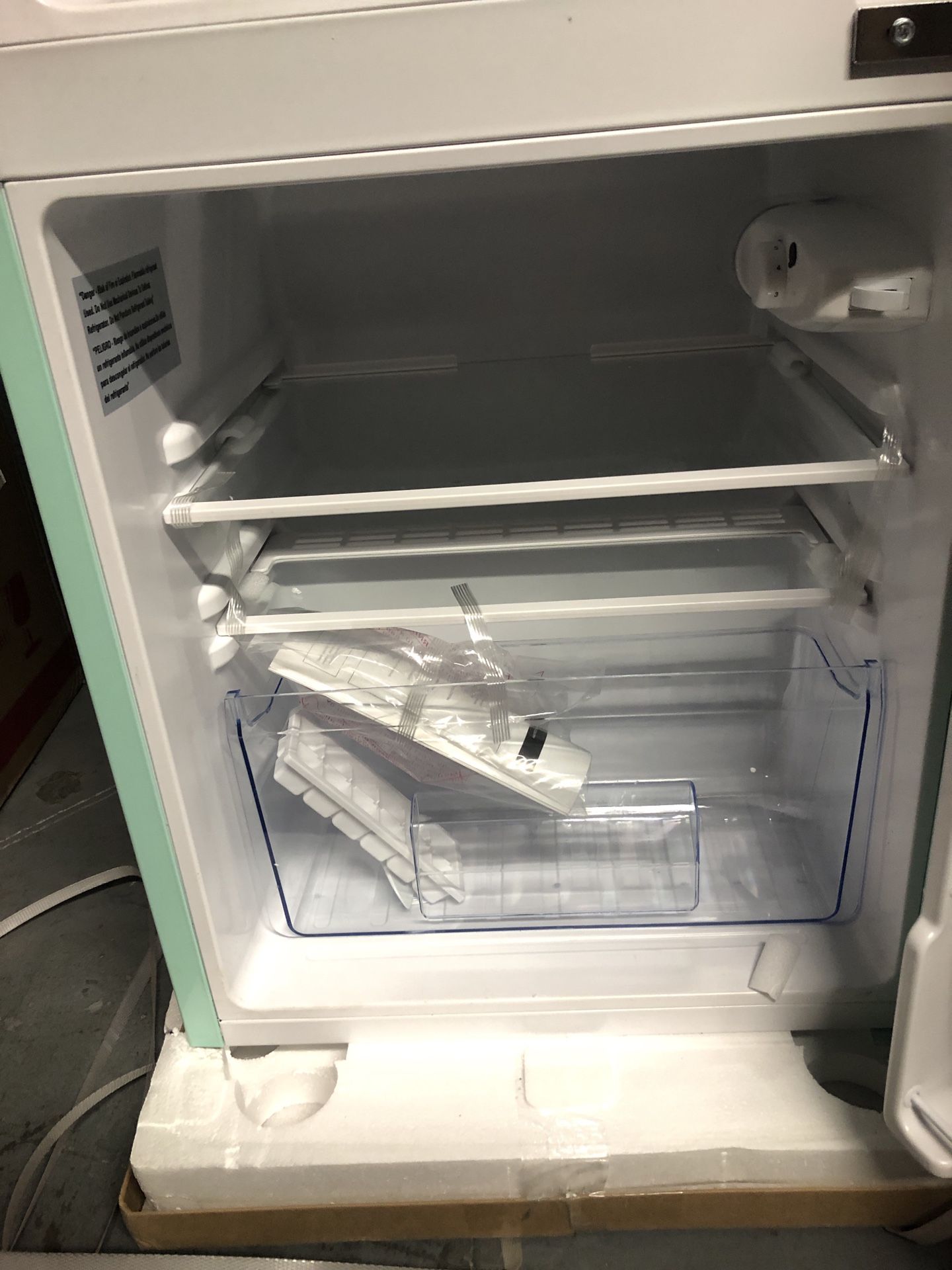 Compact Mini Refrigerator with Separate Freezer in the box with small dent on one side
