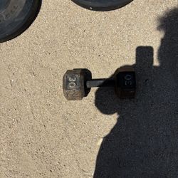 2-25pound Plates 1-30pound Dumbbell
