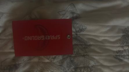 sprayground gold/red tags with backpack tag