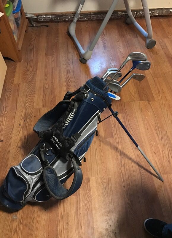 Back back caddy and clubs golf