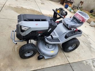 Shop Murray MT200 42 in. 19.0 HP 540cc EX1900 Series Briggs and Stratton Engine Automatic Gas Riding Lawn Tractor Mower Questions & Answers (285)