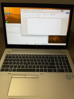 HP laptop. Intel Core i7. 16GB RAM. Microsoft Office included