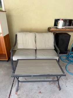 Outdoor love seat and table