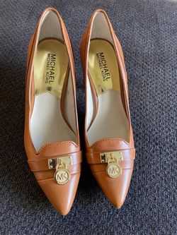 Michael Kors cognac brown leather pumps. Never worn. Size 5