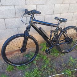 Electric mountain bike with charger 20 mph 20 mile distance 240 $