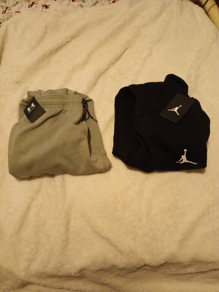 Junior boys sweatpants Michael Jordan brand and under armor sweatpants brand new cream color size large