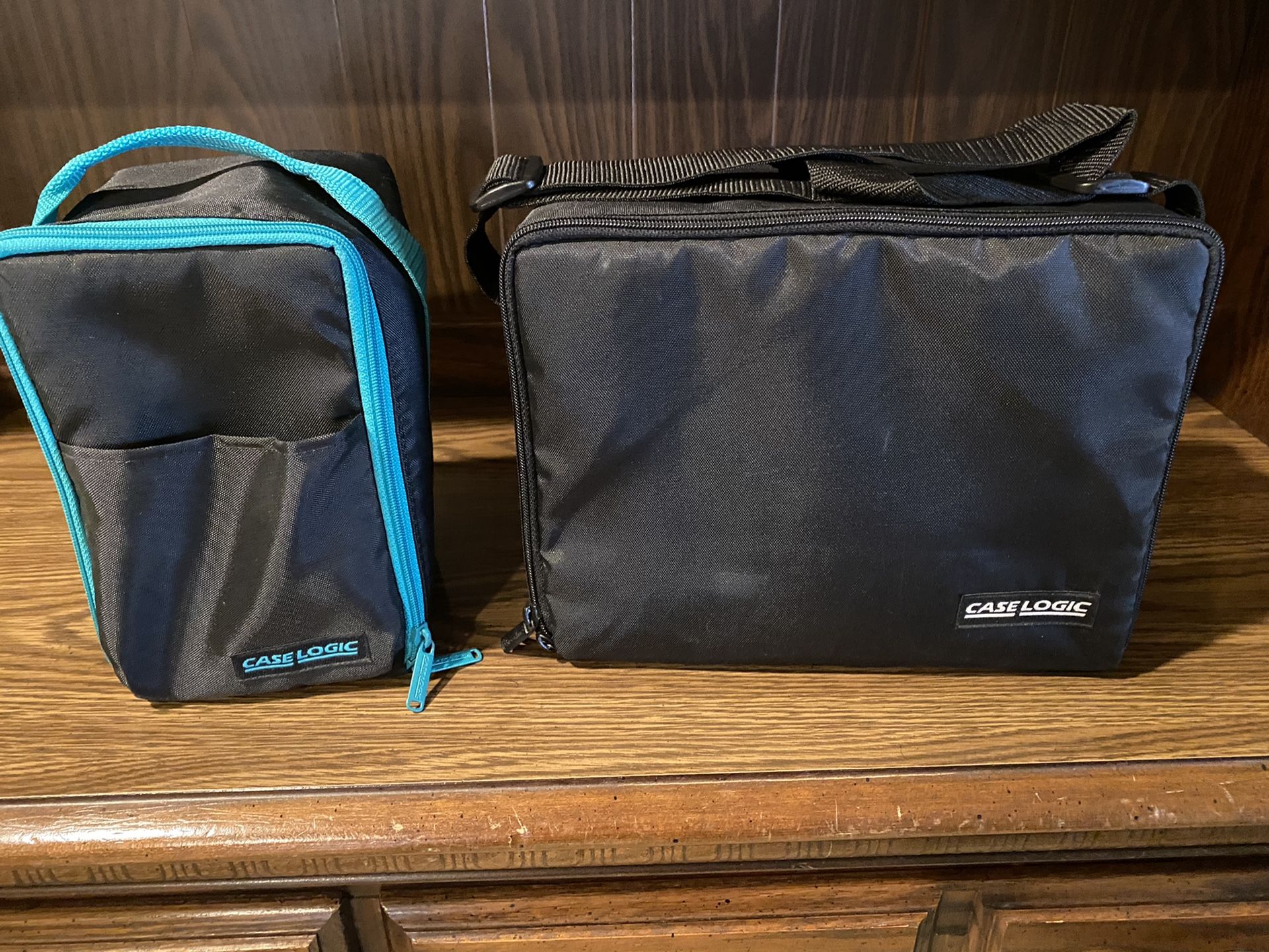 Case Logic 30 CD Holder $15 and Case Logic single CD Holder $8