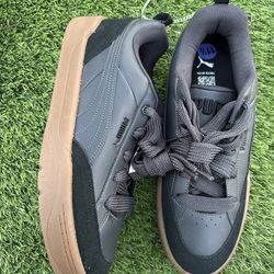 Puma sneakers size 11.5 dark gray 