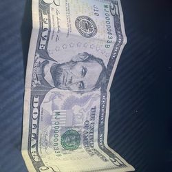 A 5 dollar bill serial number mj 00000833b