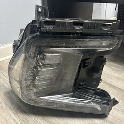 GMC Yukon Denali Driverside headlight