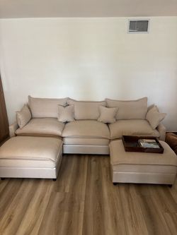 Chic and comfortable sofa couch with ottomans
