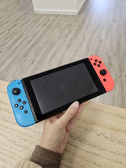 Nintendo Switch - V2 with Neon Blue and Neon Red Joy-Con HAC-001(-01) Good