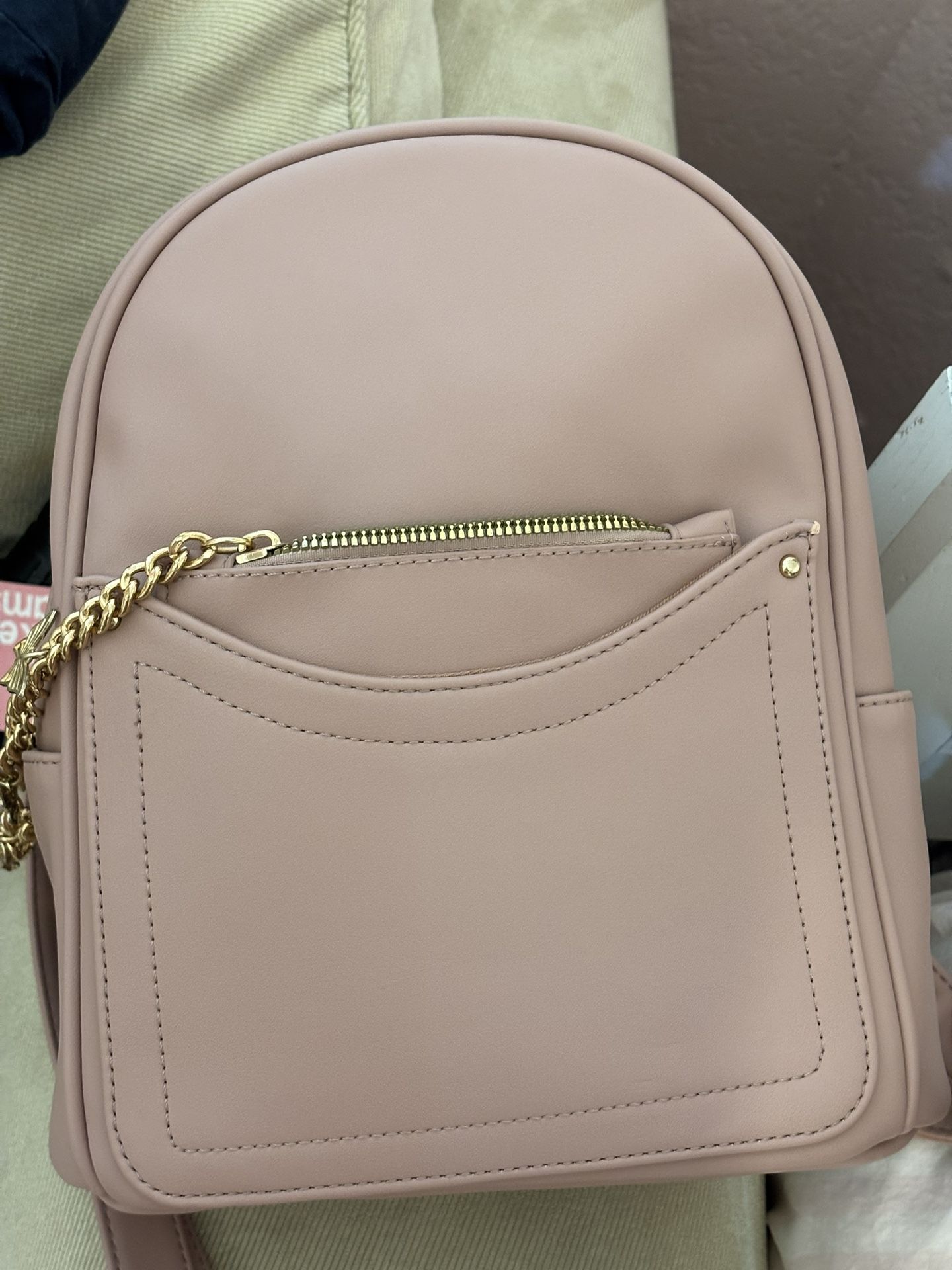 dusty pink/purple mini backpack with tag