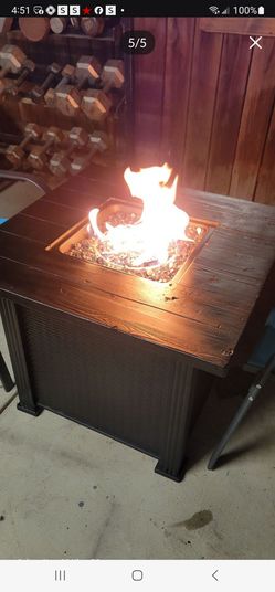 32" Propane Fire Pit Table With 2 new patio chairs