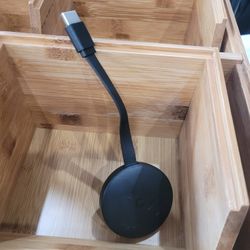 Google Chromecast - Streaming Device with HDMI Cable - Stream Shows, Music, Photos, and Sports from Your Phone to Your TV
