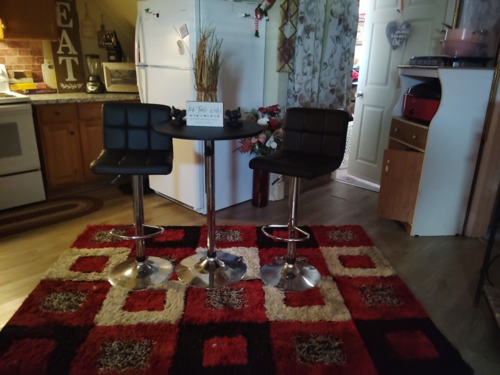 Swivel, Adjustable Pub Table And Chairs
