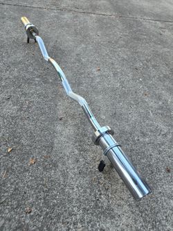 Oylimpic curl bar with spring locks