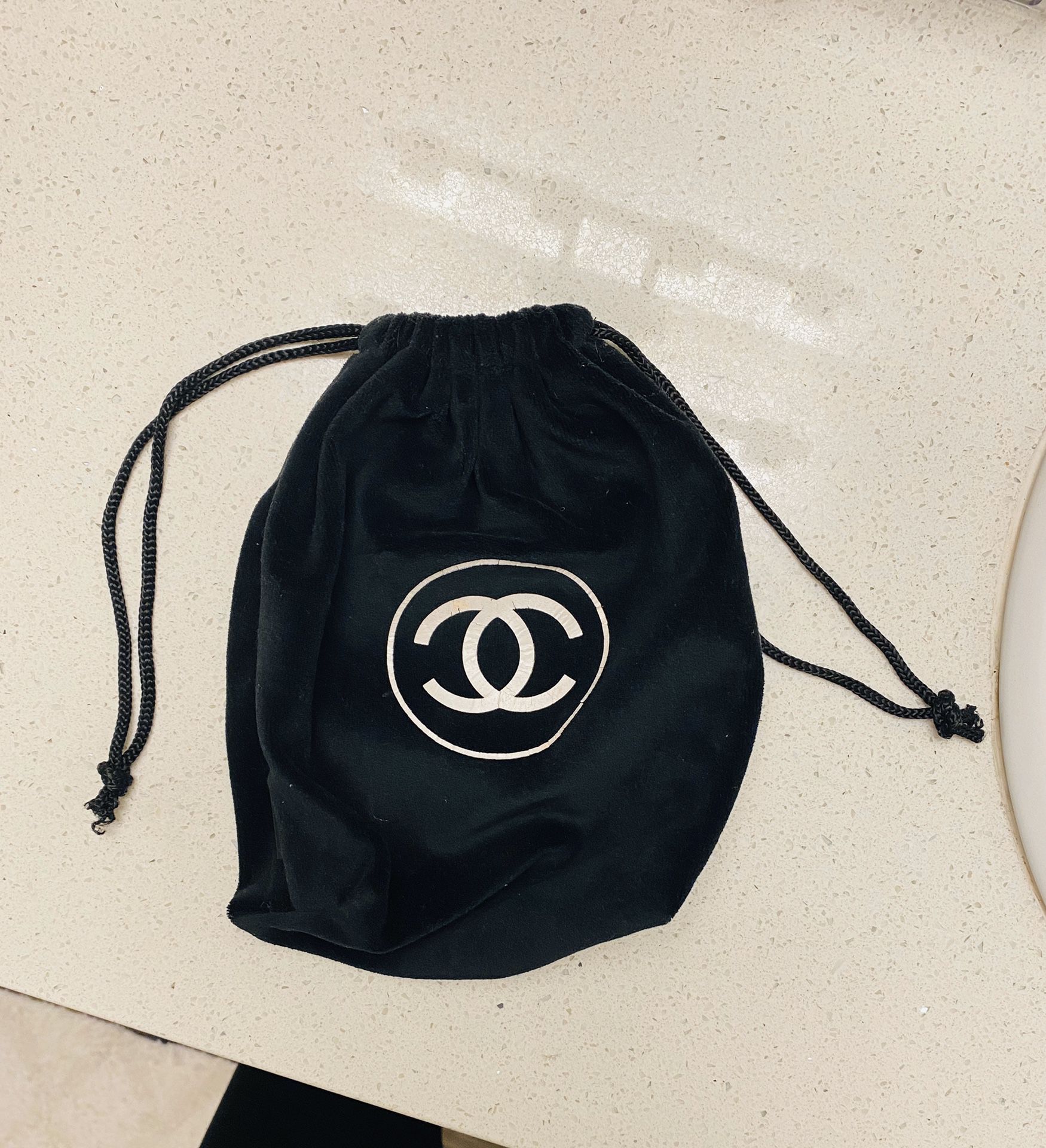 Chanel black velvet drawstring bag