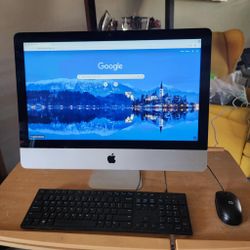 Imac 21.5-inch late 2015 **READ FULL ** NO TRADES ** Intel Core i5 2.8 GHz 8GB RAM  256GB SSD  MacOS Monterey version 12.7. It has a small crack line,
