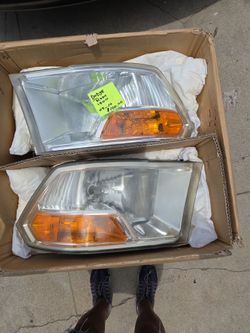 Dodge Ram 1500  09-10 Headlights