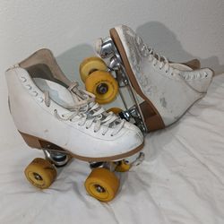 Size 5m6w Roller Skates