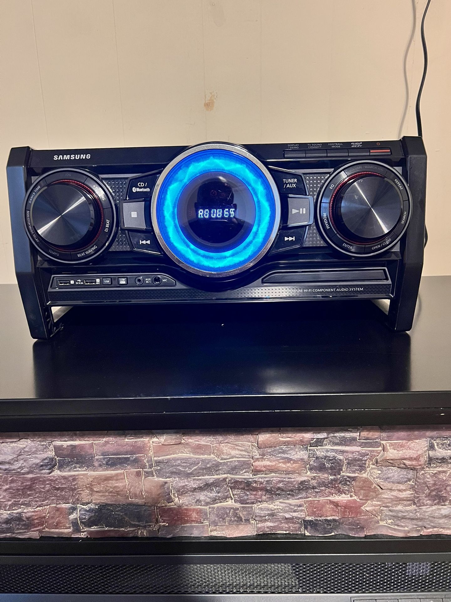 Samsung Hi-Fi Bluetooth Stereo. Equipped With Tuner, Cd Player And Usb Ports For A Flash Drive With Music. Also has giga Bass and ligh and light show.
