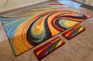 Lively multi-colored rug with 17 matching stair treads
