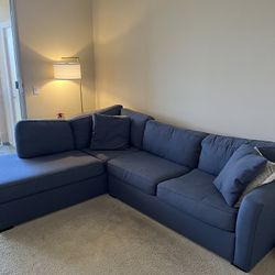 Living Spaces Blue Aspen Sectional Couch With Queen Pullout