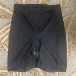 REI co-op Brand 78% polyester 22% spandex, men’s bicycling padded shorts with side pockets XXLARGE, color, black, brand NEW.