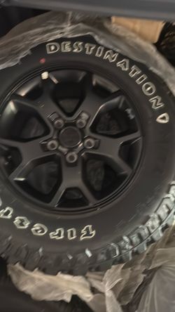 Brand new factory, Jeep Wrangler rims and tires