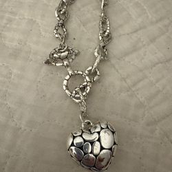 Woman’s Bracelet Not Silver Not Stainless Steel With Heart 