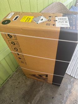 Brand new E bike still in box