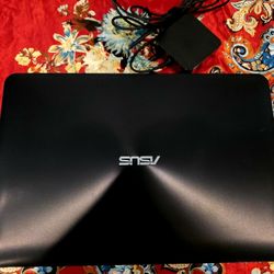 ASUS X555D Laptop & Charger – Powers On – Cracked Screen – $20